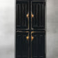 Black primitive cabinet