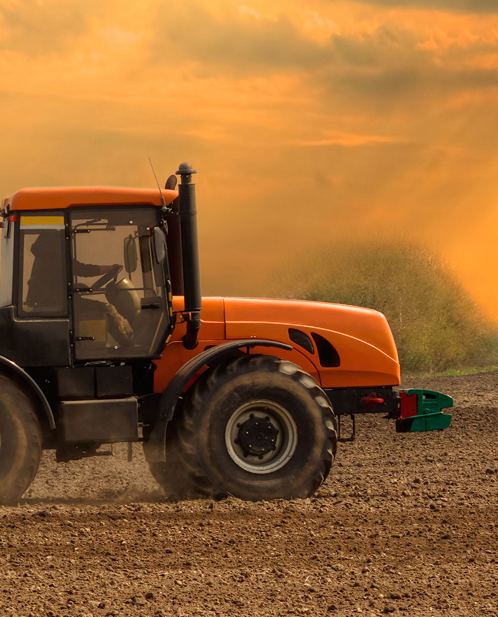 A tractor working on the field full cover magnetic fridge skin